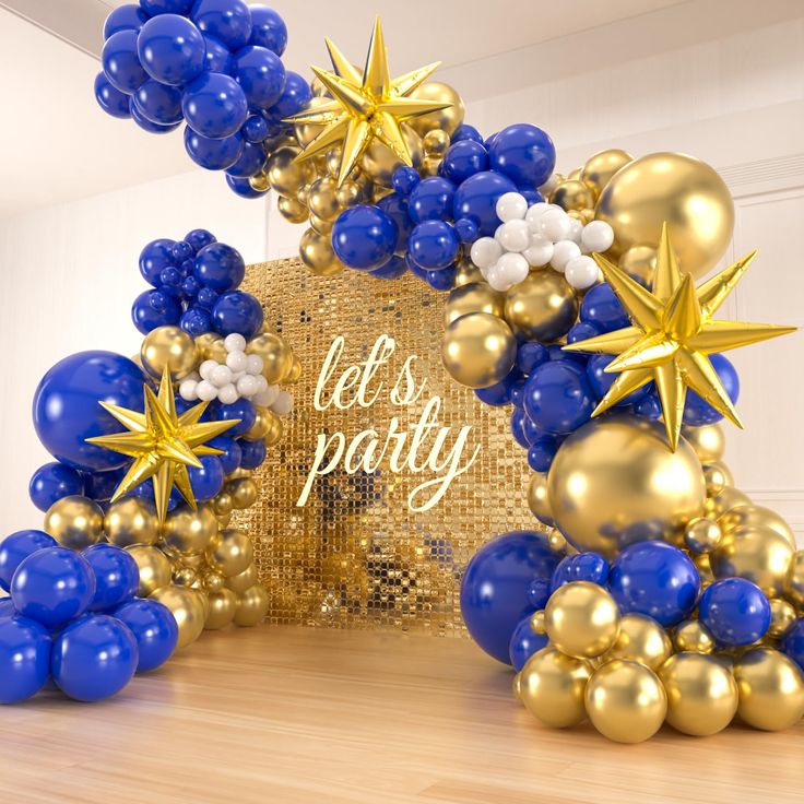 blue and gold balloon arch with stars on it