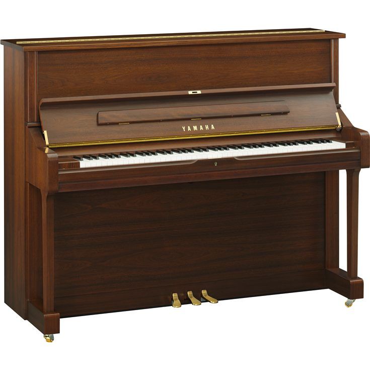 the upright piano is brown and has a wooden case with brass trimmings on it