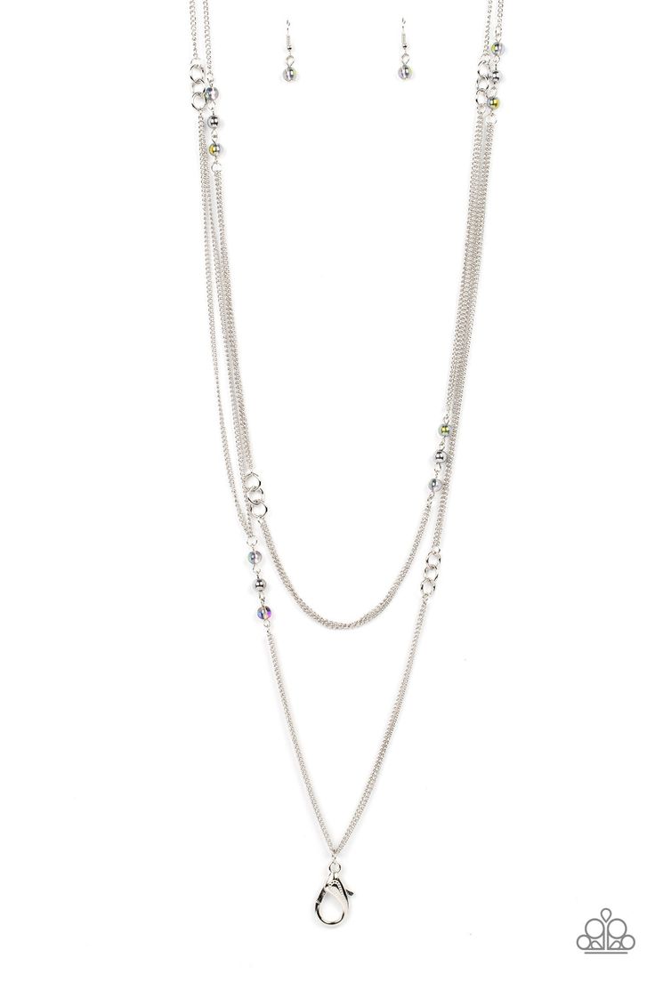 Flanked by iridescent beads, sections of classic silver beads join trios of dainty silver links along trestles of a lengthened silver chain that dramatically layers down the chest for an otherworldly effect. A lobster clasp hangs from the bottom of the design to allow a name badge or other item to be attached. Features an adjustable clasp closure. Due to its prismatic palette, color may vary.   Sold as one individual lanyard. Includes one pair of matching earrings. Cheap Nickel-free Dangle Beaded Necklaces, Cheap Metal Beaded Necklaces With Silver Beads, Multi Necklace, Lanyard Necklace, Palette Color, Paparazzi Accessories, Paparazzi Jewelry, Butterfly Earrings, Matching Earrings