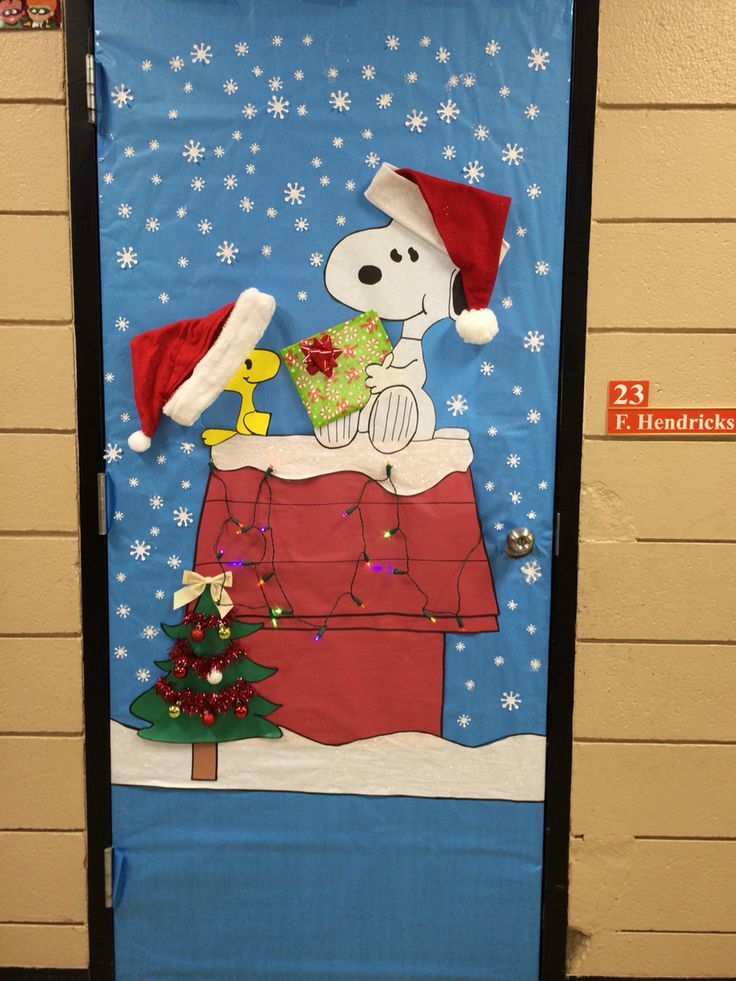 a door decorated to look like a christmas scene