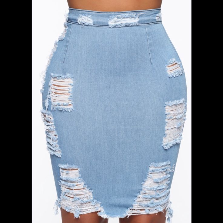 Fashion Nova Distressed Light Blue Denim Skirt. New Without Tags. High Waist Ripped Denim Skirt, Ripped High Waist Denim Skirt, Fitted Denim Ripped Mini Skirt, Fitted Denim Mini Skirt With Ripped Detail, Spring High Waist Ripped Skirt, Ripped Medium Wash Denim Skirt, Fitted Ripped Medium Wash Denim Skirt, Ripped Denim Skirt In Medium Wash, Summer Ripped Light Wash Skirt