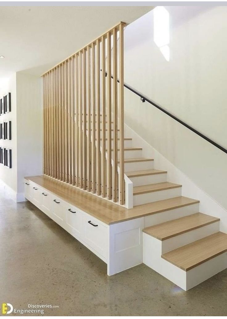 the stairs are made of wood and white