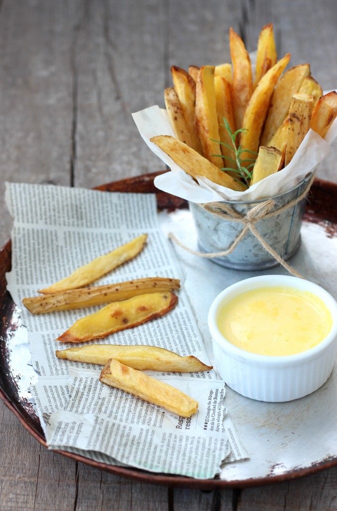 french fries on a tray with dipping sauce