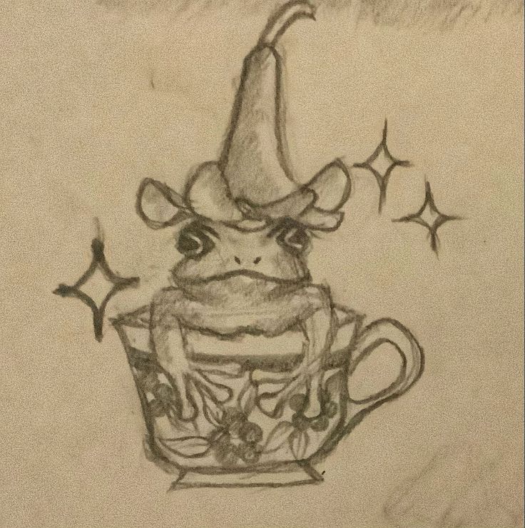 a drawing of a frog sitting in a teacup with stars around its head and eyes