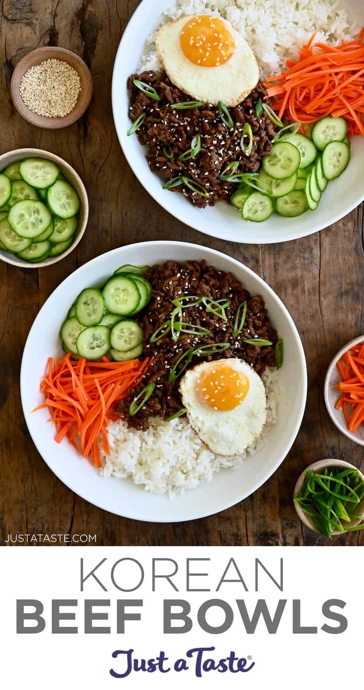 korean beef bowls with carrots, cucumbers and rice on a wooden table