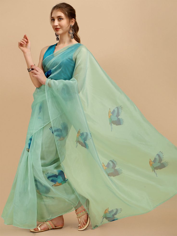 Sea green and blue sareeAbstract printed saree with no borderThe saree comes with an unstitched blouse piece, Check the image of the blouse piece to understand how the actual blouse piece looks like Blue Saree With Printed Border For Festivals, Green Pre-draped Saree With Printed Motifs, Blue Unstitched Saree With Printed Border, Blue Semi-stitched Saree With Printed Border, Semi-stitched Blue Saree With Printed Border, Blue Saree With Printed Border, Turquoise Semi-stitched Blouse Piece For Saree, Semi-stitched Turquoise Saree Blouse Piece, Blue Semi-stitched Pre-draped Saree With Printed Border