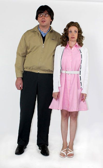 a man and woman standing next to each other