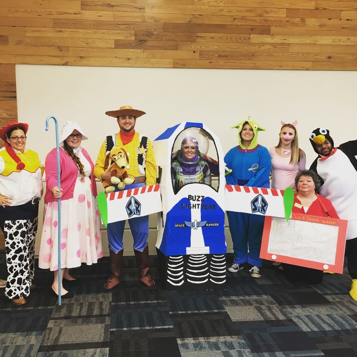 a group of people dressed up in costumes