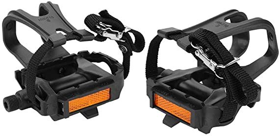 pair of black and orange bicycle pedals on white background