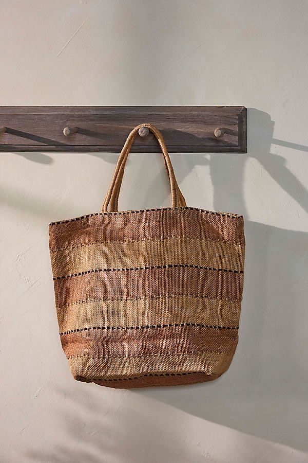 Handwoven from jute, this striped jute shopper is a durable solution to single-use bags. The timeless design work is created by hand using wooden looms, while their color palettes are achieved using natural dyes. Made by artisans working within a fair trade collective from a woman-owned brand. | Neutral Stripe Jute Tote Bag at Terrain Jute Tote Bag, Garden Boots, Garden Bags, Jute Tote Bags, Jute Totes, Perfect Handbag, Boho Bags, Straw Tote, Unique Bags