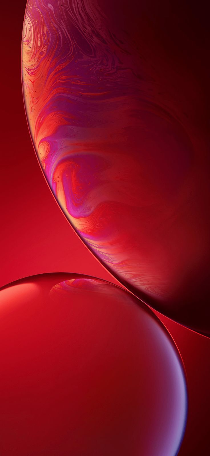 the back side of an iphone xr with red and purple swirls on it