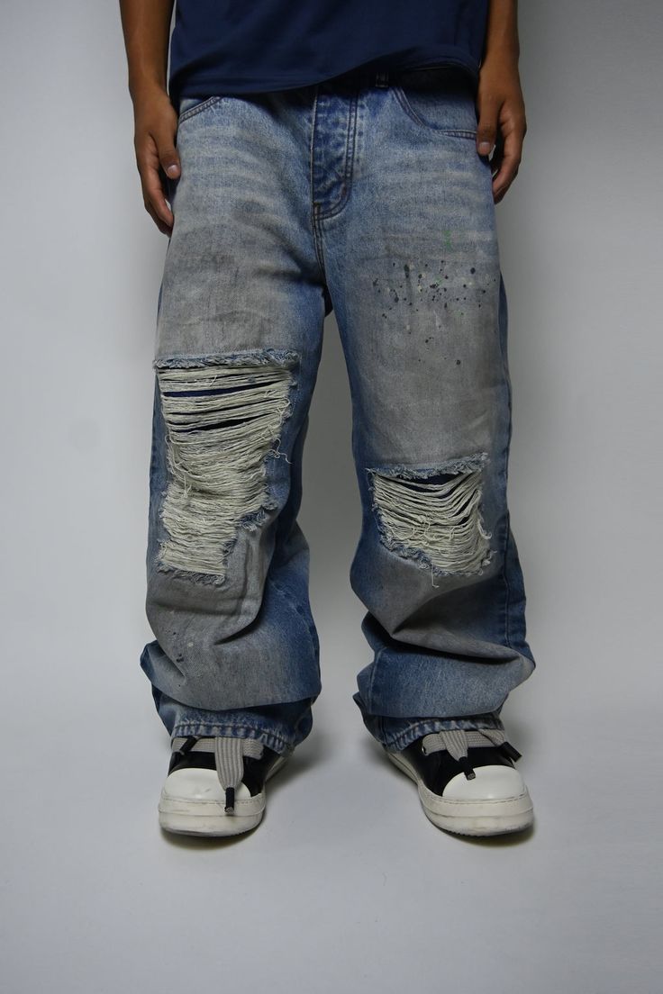 Indesicive Denim Jeans Distressed Medium Wash Rigid Denim Jeans, Urban Distressed Medium Wash Jeans, Hip Hop Blue Distressed Bottoms, Washed Blue Ripped Rigid Denim Bottoms, Ripped Jeans In Medium Wash Rigid Denim, Ripped Medium Wash Rigid Denim Jeans, Urban Distressed Denim Jeans, Urban Style Ripped Denim Jeans, Urban Ripped Denim Jeans