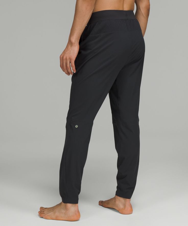 Feel the moment, not the heat. These high-stretch yoga pants feel cool to the touch and have mesh fabric ventilation. Designed for Yoga. Streamlined fit that skims glutes and thighs, then tapers to hem. Elastic-free waistband eliminates bulk. Secure pockets for your essentials and a hidden phone sleeve. Identity Design Logo, Mens Joggers, Personal Shopping, Mens Sweatpants, Mesh Fabric, Short Pants, The Heat, Yoga Pants, Pajama Pants