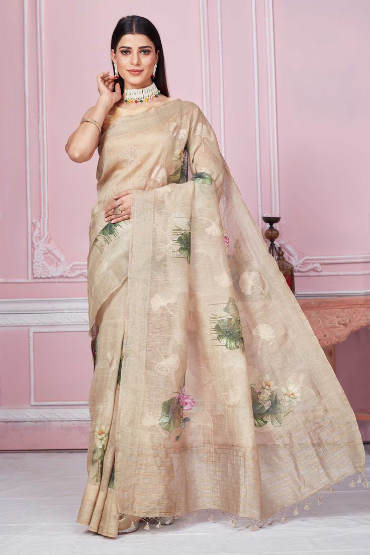 Buy stunning beige floral print Banarasi saree online in USA. Look your best on festive occasions in latest designer sarees, pure silk saris, Kanchipuram silk sarees, handwoven sarees, tussar silk saris, embroidered sarees from Pure Elegance Indian fashion store in USA.-full view Semi-stitched Beige Saree With Zari Work, Semi-stitched Beige Saree In Traditional Drape, Beige Semi-stitched Saree In Traditional Drape, Beige Semi-stitched Saree With Zari Work, Unstitched Beige Saree With Zari Work, Unstitched Beige Bollywood Saree, Traditional Tissue Silk Saree With Floral Print, Traditional Beige Saree, Bollywood Style Beige Saree With Unstitched Blouse