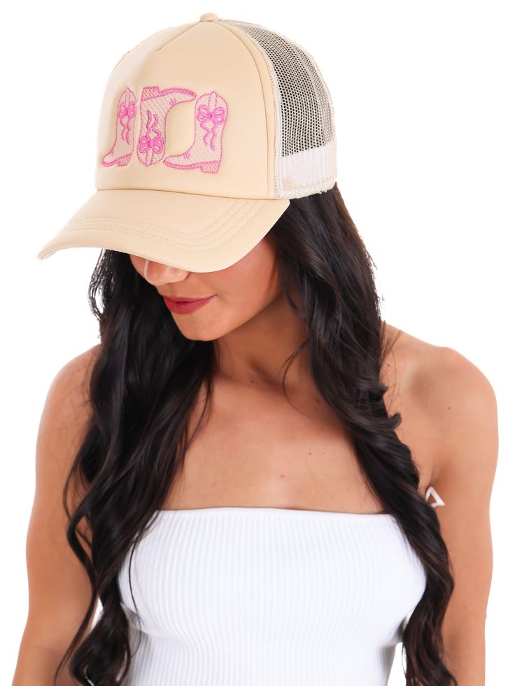 Yeehaw meets style in our Boot Bow Cowgirl Trucker Hat! This quirky hat features cowboy boots with bows that will make any cowgirl stand out. Perfect for a playful and fashionable look. Giddy up and grab one today! Summer Trucker Hat For Rodeo, One Size, Summer Trucker Hat For Rodeo, Summer Adjustable Trucker Hat For Rodeo, Spring Rodeo Trucker Hat, One Size Fits Most, Western Style Summer Trucker Hat With Curved Brim, Western Style Trucker Hat For Summer Beach, Western Style Trucker Hat With Curved Brim For Summer, Western Style Trucker Hat For Beach In Summer, Spring Rodeo Trucker Hat One Size Fits Most