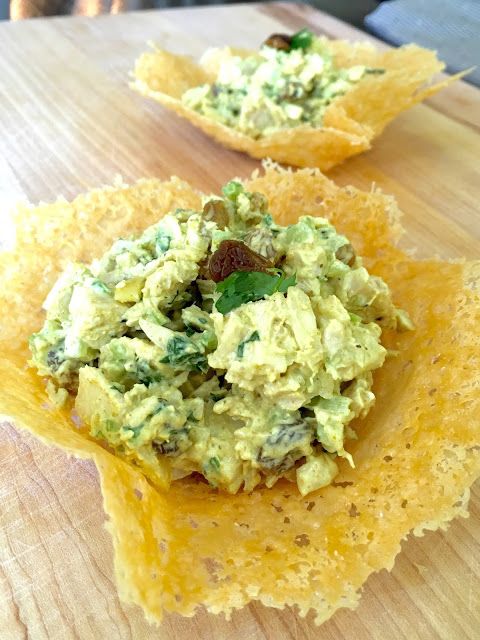 guacamole and tortilla chips on a cutting board