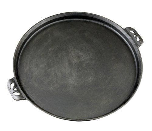 an empty cast iron skillet on a white background