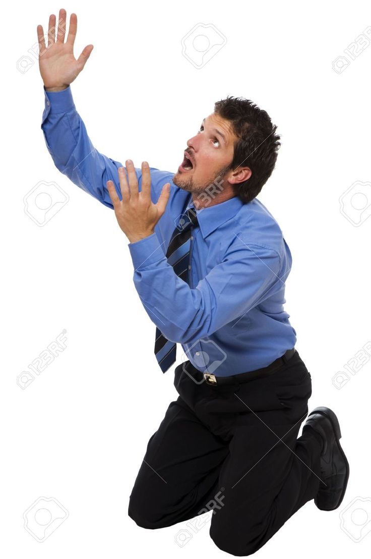 a man jumping up in the air to catch a frisbee with his hands