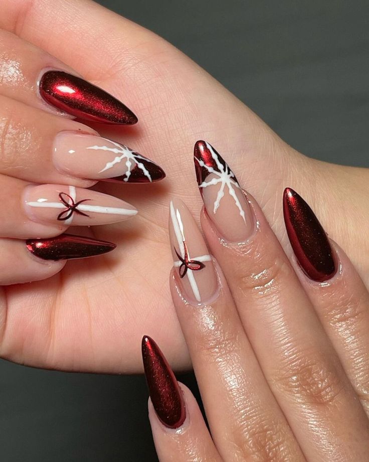 2. Metallic Red with Snowy Accents Medium Almond Nails Christmas, French Tip For Christmas, Christmas Nail Almond Ideas, Nail Inspo Almond New Years, Christmas Idea Nails, Nail Design Ideas Christmas, Cool Christmas Nails Design, Red Peppermint Nails, Christmas Nails￼