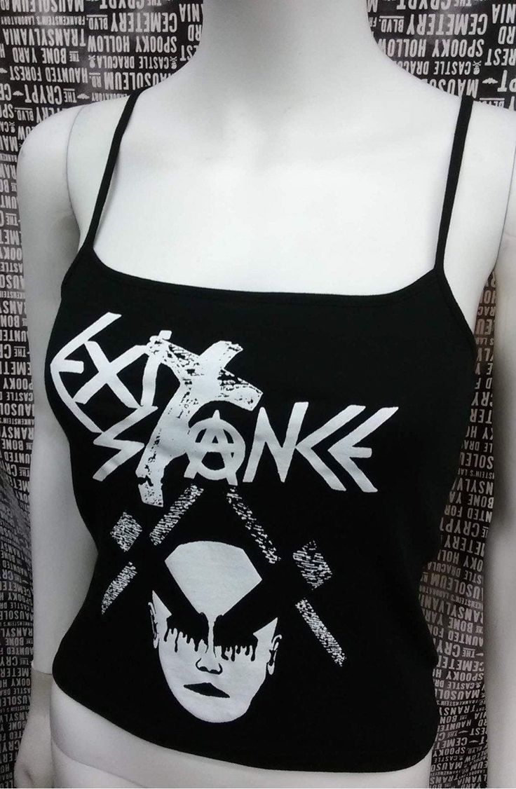 This is a black Exit-Stance crop tank top with spaghetti straps. This has a Exit-Stance image screen printed on the front. 57% cotton/ 38% polyester/ 5% Spandex These are handmade screenprinted and slightly vary from the photo. Please feel free to email me any questions. Thanks for looking. Due to an influx of incorrect addresses if a package is returned, you must pay the shipping cost to resend the item to you. I do not do exchanges and I do not take returns unless the item is damaged. I thorou Y2k Outfit Ideas, Black Cami Top, Black Cropped Tank, Black Crop Top Tank, Flowy Mini Dress, Print Tank Top, Top Summer, Girls Rock, Print Tank