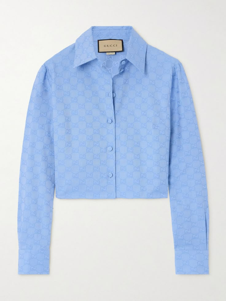 Gucci's shirt is cut from cotton Oxford and jacquard-woven with the label's signature 'GG Supreme' motif in tonal-blue threads. It's cut in a slightly loose, cropped shape and has a row of covered buttons. Leave a few undone to give it an effortless, laid-back feel. Gucci Clothes Women, Gucci Shirt Women, Gucci Clothes, Blue Oxford Shirt, Gucci Shirt, Gucci Top, Chanel Shirt, Streetwear Essentials, Jacquard Shirt