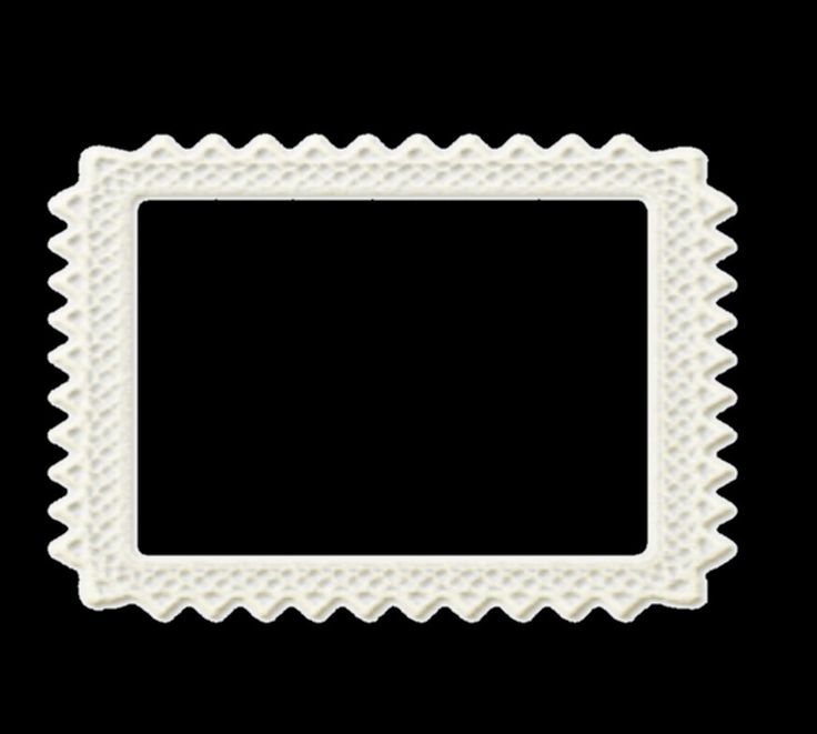 a small white square with scalloped edges on a black background stock photo - 1307982