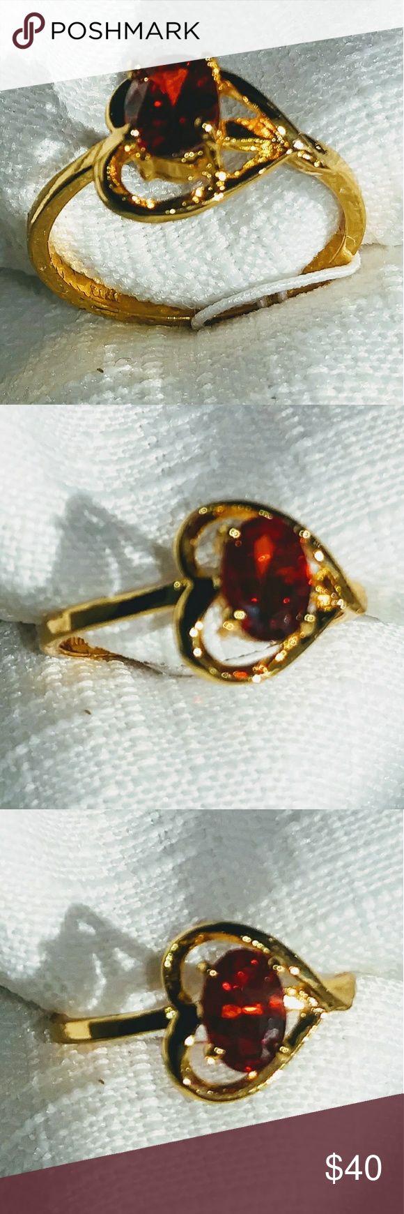 Beautiful dainty garnet heart ring Fun and dainty garnet ring in the shape of a heart. 14k yellow gold Over silver. Sz 7. Also available in citrine and peridot Jewelry Rings Oval Heart Ring For Valentine's Day Promise, Oval Heart Promise Ring For Valentine's Day, Heart-shaped Gemstone Ring For Valentine's Day, Oval Gemstone Heart Ring As Gift, Oval Gemstone Heart Ring For Gifts, Gold Heart Ring With Gemstone, Gold Heart Ring With Oval Gemstone, Yellow Gold Oval Heart Ring For Valentine's Day, Formal Heart Cut Birthstone Ring For Valentine's Day