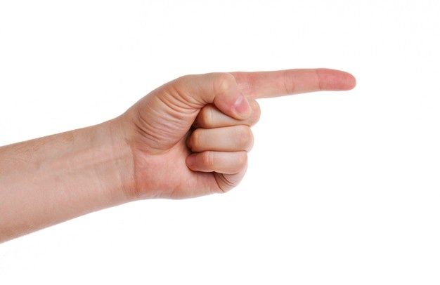 a person pointing at something with their finger