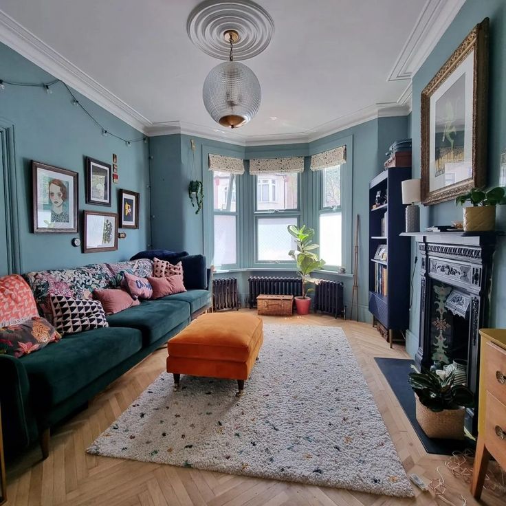 a living room filled with furniture and a fire place