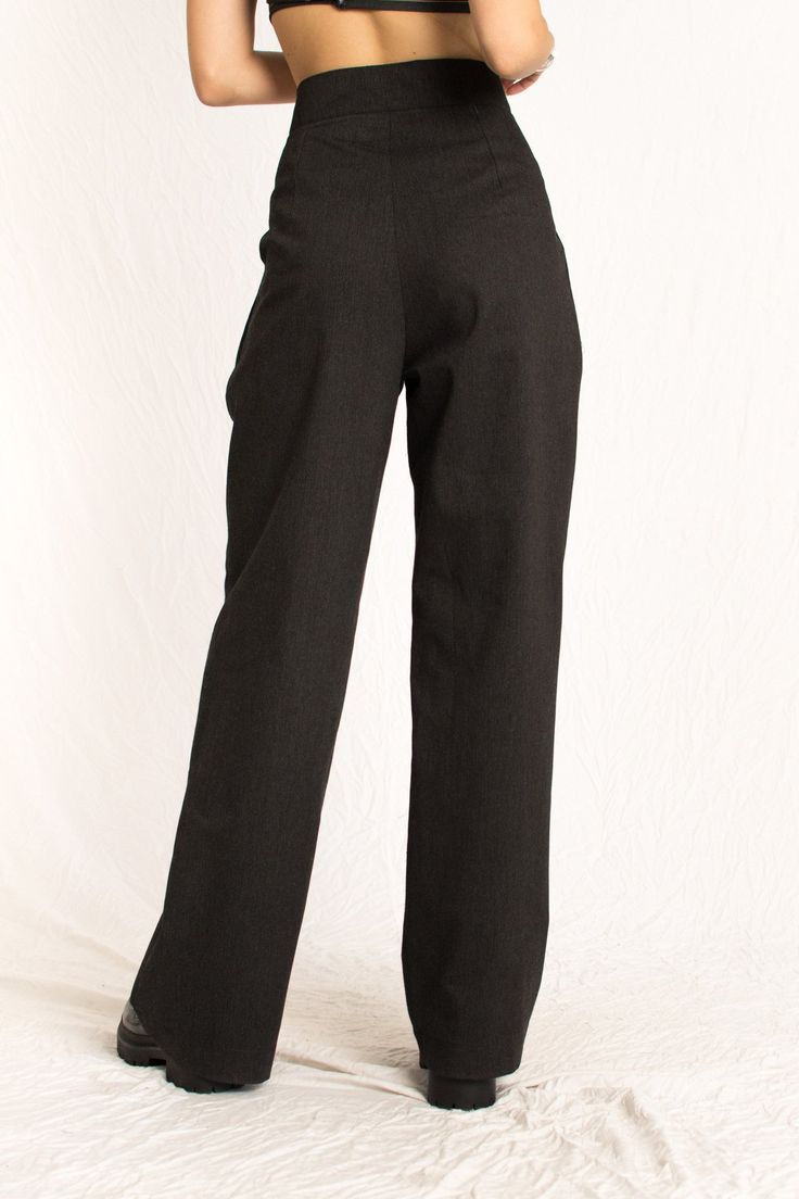 The higher the waistline, the higher the paycheck! The Sara Pants are tailored style fitted at the waist, made from a luxurious wool blend. These elegant high-waisted, slightly wide-leg trousers feature two front pleats with hidden button closure and a hidden zipper with two side pockets. These sustainable pants are tailor made and on demand. It takes us 7 hours to make these pants. Check out the pricing transparency HERE. PLEASE ALLOW 1-3 BUSINESS DAYS FOR PRODUCTION Chic High Waist Wool Wide Leg Pants, Chic High Waist Wide Leg Wool Pants, Classic High Waist Wool Wide Leg Pants, Wool Wide Leg Dress Pants With Belt Loops, Formal High Waist Wool Wide Leg Pants, Formal High Waist Wide Leg Wool Pants, Formal High Waist Wide Leg Pants, High Waist Wool Wide Leg Pants For Work, Solid Wool Dress Pants For Work