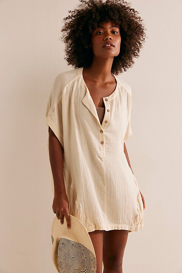 The definition of effortless, this easy tunic from our free-est collection is perfect for the beach and beyond. **Fit:** Loose, oversized fit **Features:** Henley button-up neckline, draped dolman sleeves, textured woven fabrication **Why We ❤ It:** Easily thrown over your swimwear or layered with lounge bottoms, this style has endless ways to wear. | Alida Tunic by free-est at Free People in White, Size: S Spring Casual Oversized Beach Dress, Oversized Casual Beach Dress For Spring, Summer Tunic Tops For Loungewear, Casual Tunic Beach Dress For Loungewear, Casual Beach Tunic Dress, Oversized Casual Beach Dress, Casual Unlined Beach Dress, Summer Tops With Relaxed Fit And Unlined, Summer Relaxed Fit Unlined Tops