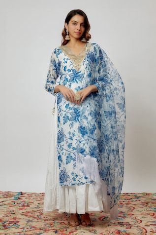 Blue and white chanderi kurta with floral print and sequins embroidered neckline. Comes with pant, a crushed cotton inner anarkali and an organza dupatta with fringed hem. - Aza Fashions Blue Bohemian Palazzo Set With Zari Work, Bohemian Blue Sharara With Cutdana, Blue Bohemian Chanderi Palazzo Set, Blue Bohemian Designer Wear Dupatta, Blue Bohemian Style Designer Wear Dupatta, Blue Bohemian Anarkali Set For Wedding, Bohemian Blue Anarkali Set With Chikankari Embroidery, Blue Bohemian Dupatta With Gota Work, Blue Bohemian Salwar Kameez For Wedding