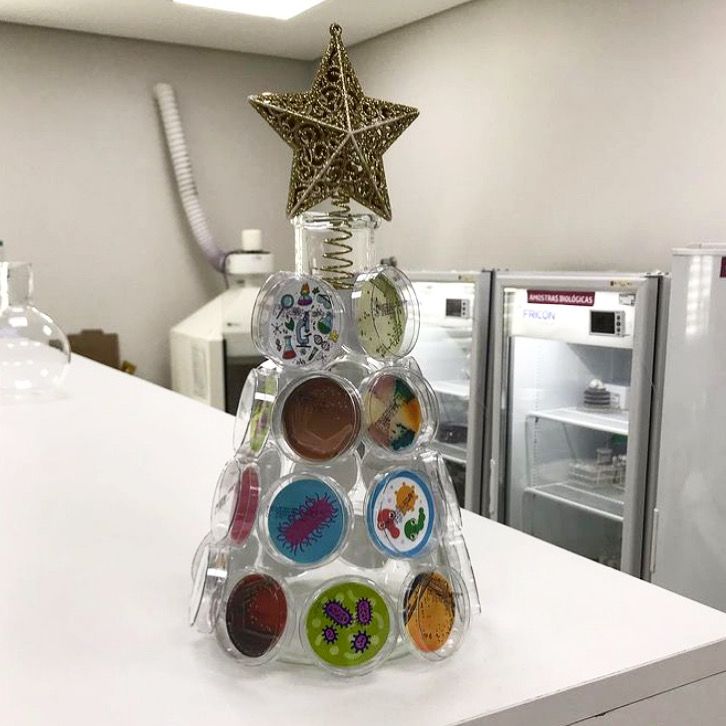 a christmas tree made out of magnets sitting on top of a white countertop