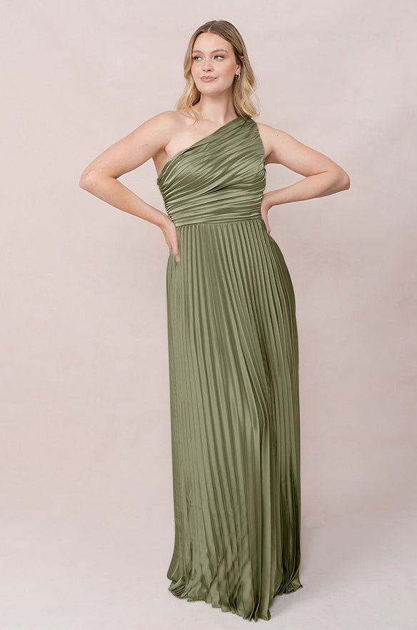 Model: Sydney; Size: 10; Color: Moss Pre-draped One Shoulder Dress For Prom, Pre-draped Bridesmaid Dress With Asymmetrical Neckline, Pre-draped One Shoulder Dress For Spring, One Shoulder Dress With Ruched Bodice For Gala, One-shoulder Ruched Maxi Dress For Gala, One Shoulder Ruched Maxi Dress For Gala, One Shoulder Dress With Ruched Fitted Bodice, Gala One-shoulder Dress With Ruched Bodice, One-shoulder Maxi Dress With Ruched Bodice