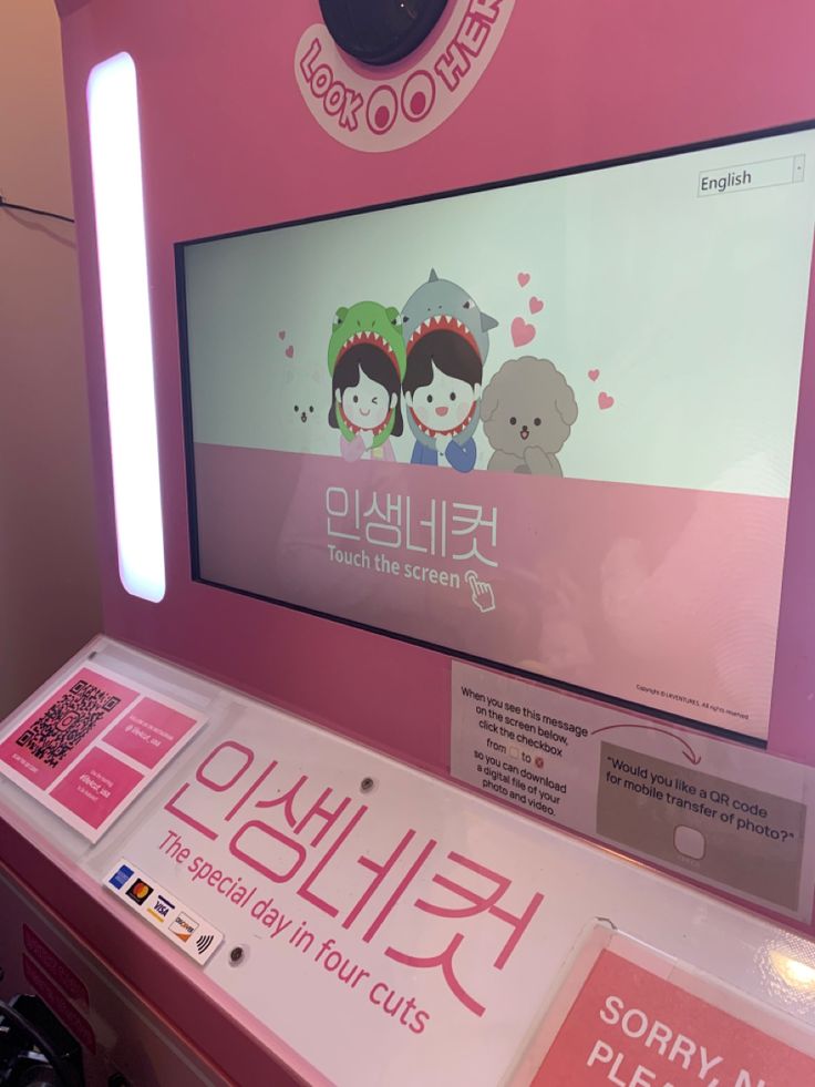 a pink display case with an advertisement on it