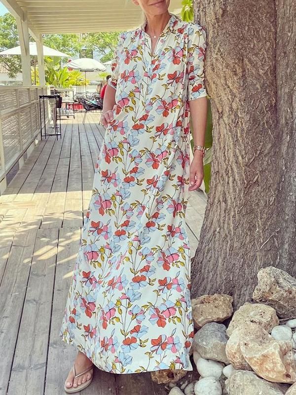 Spring Beach Dress With Half Sleeves, Spring Beach Dresses With Half Sleeves, Half Sleeve Dresses For Spring Vacation, Casual Floral Print Maxi Dress With 3/4 Sleeve, Casual Maxi Dress With Floral Print And 3/4 Sleeve, Spring Modest Long Midi Dress, Modest Long Midi Dress For Spring, Spring Half-sleeve Printed Dresses, Spring Half Sleeve Printed Dresses