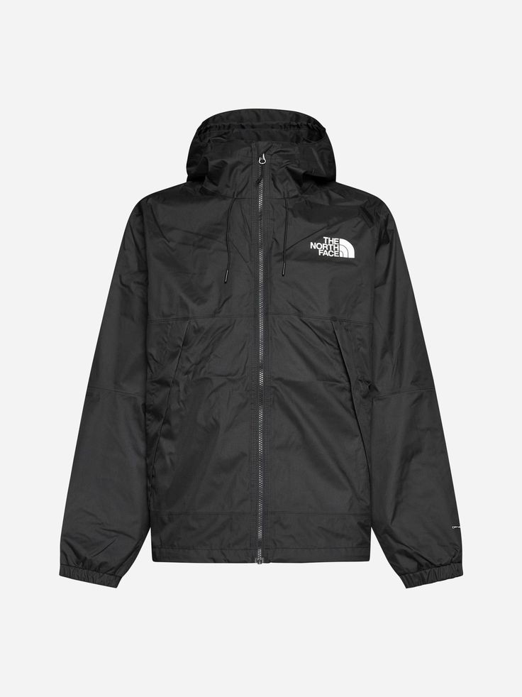 The North Face's Mountain jacket in black nylon featuring a hood with adjustable drawstring, high collar, front zip fastening, logo embroidered on the chest and on the back, side zip pockets and elasticated cuffs. Composition: 100% recycled polyester North Face Coats, North Face Mountain Jacket, North Face Mountain, Mountain Jacket, North Face Coat, Casual Jackets, Black Nylon, Black Nylons, Casual Jacket