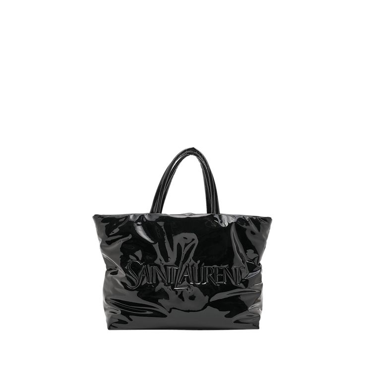 Saint Laurent tote bag in patent leather (polyurethane/polyester) Embossed logo at front Two top carry handles; drop 7.9" Inner, one zip pocket  Approx. 24.4"L x 17.3"H x 7.9"D Made in Italy Saint Laurent Tote, Embossed Logo, Patent Leather, Zip Pockets, Saint Laurent, Tops Designs, Tote Bag, Luxury Fashion, ? Logo