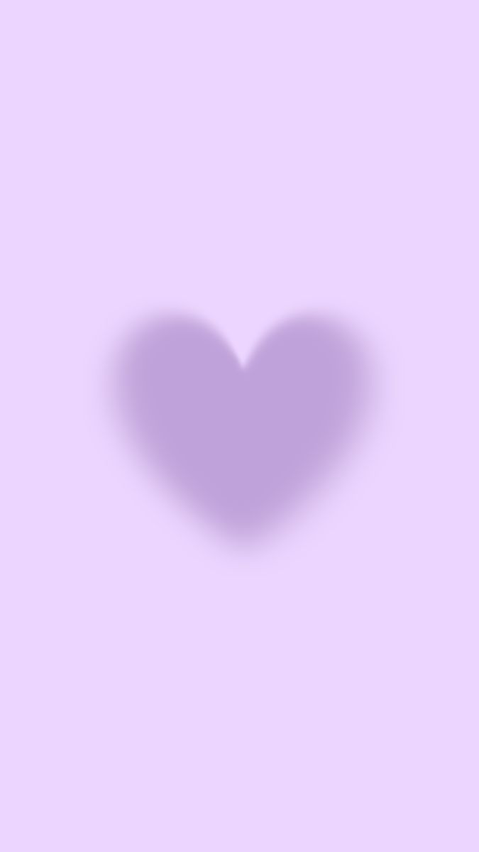 the shadow of a heart on a purple background