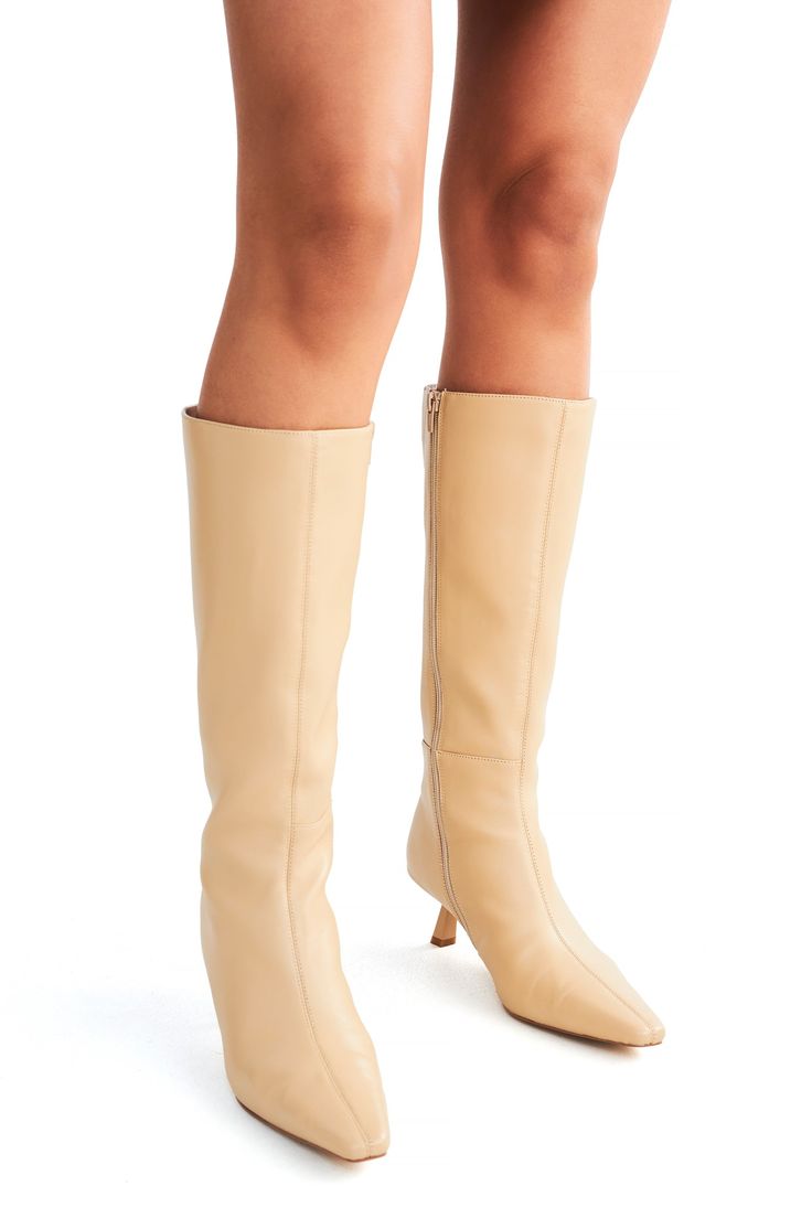 The Freya by Nakedvice is a sand colour knee high boot crafted from rich nappa leather. Designed to be your new go-to leather knee high boot, The Freya are here just in time to elevate your summer wardrobe. Size: 5, 6, 7, 8, 9, 10, 11; Colour: SAND Beige Leather Knee-high Boots With Pointed Toe, Chic Beige Wide Calf Knee-high Boots, Spring Leather Knee-length Boots, Leather Knee-length Boots For Spring, Spring Knee-length Leather Boots, Chic Leather Mid-calf Heeled Boots, Knee-length Leather Spring Boots, Knee-high Calf Leather Boots For Spring, Beige Leather Knee-high Boots With Comfort Fit