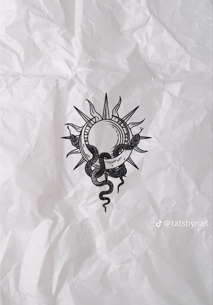 a drawing of a sun with a snake on it