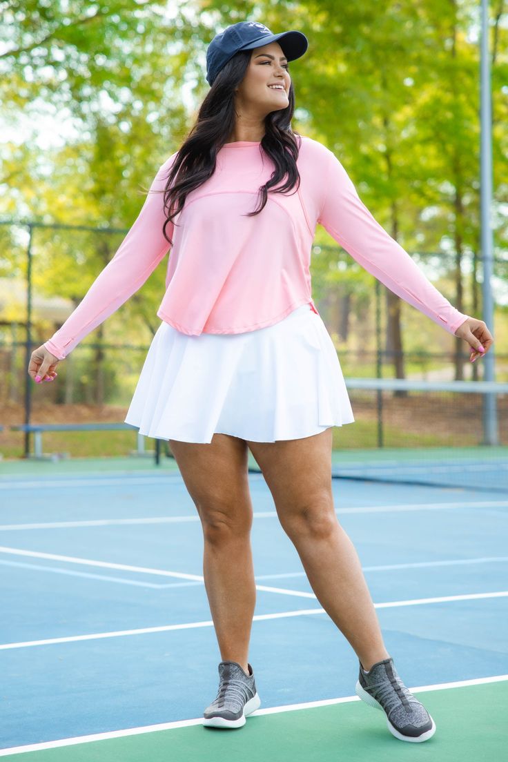 Get out and get active in this comfy cutie! Constructed with a soft and stretchy fabric, this skirt offers all-day comfort and can move with you from your workout to running errands! The classic white design never goes out of style and looks great in any season! 95% Polyester, 5% Spandex White Athleisure Tennis Dress With Built-in Shorts, Casual White Stretch Skort, White Tennis Activewear With Built-in Shorts, Spring Athleisure Workout Skort, Sporty Solid Color Skort With Flowy Fit, Athleisure Solid Color Lined Tennis Skirt, Sporty Mini Skirt Activewear For Gym, Athleisure Solid Tennis Skirt With Lining, Solid Color Lined Tennis Skirt Athleisure Style