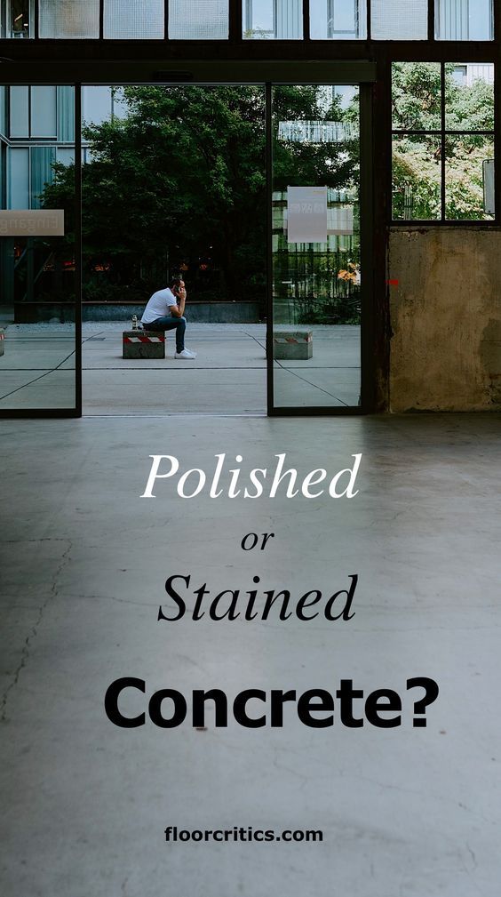 a man sitting on a bench in front of a building with the words polished or stained concrete?