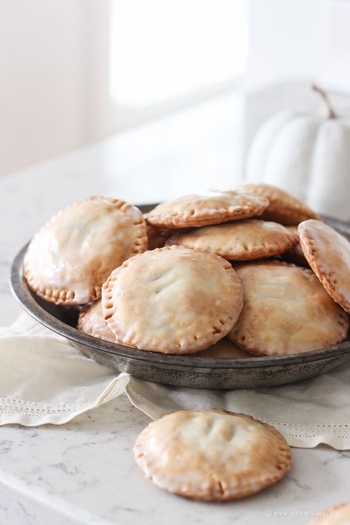 some small pies are sitting on a plate