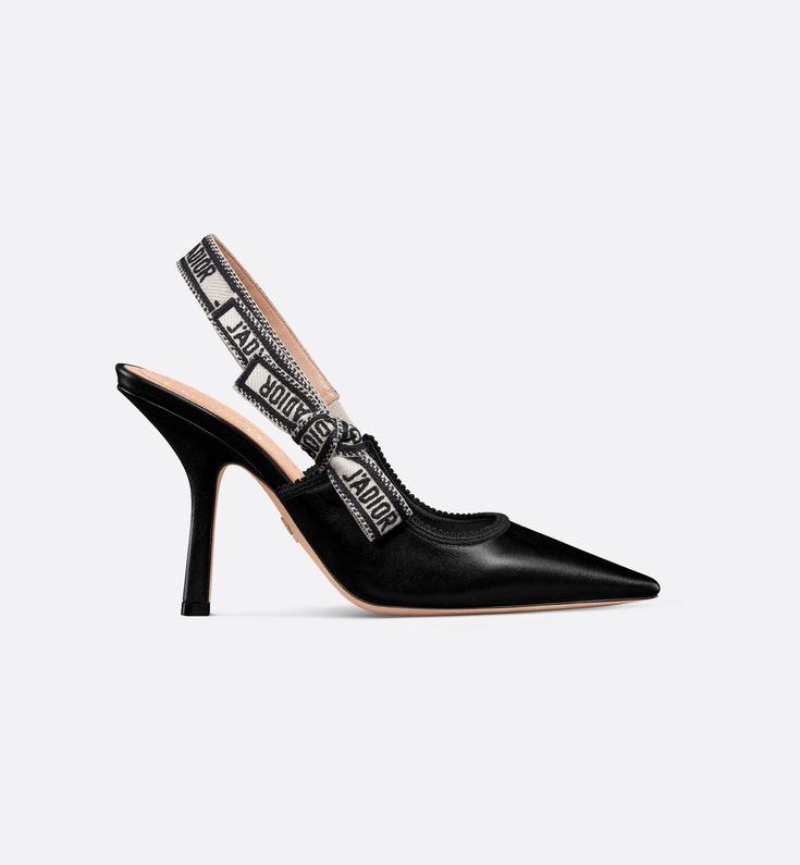 The J'Adior slingback pump is a prime example of Dior's savoir-faire. Crafted with passion in Christian Dior's Italian ateliers, the silhouette is distinguished by black calfskin. The J'Adior two-tone embroidered ribbon is embellished with a flat bow, and a 10-cm (4) comma heel offers an elegant and refined finishing touch.. Dior Heels, Dior Star, Embroidered Ribbon, Silver Pumps, Gold Pumps, Designer Pumps, Blue Pumps, Bow Flats, Star Shoes