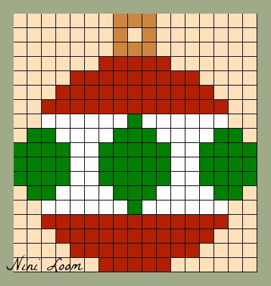 a cross stitch christmas ornament in red, green and white