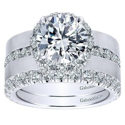 a white gold engagement ring set with diamonds