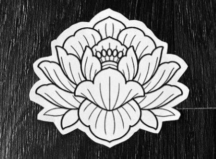 a black and white image of a flower on a wooden surface with the words,'i