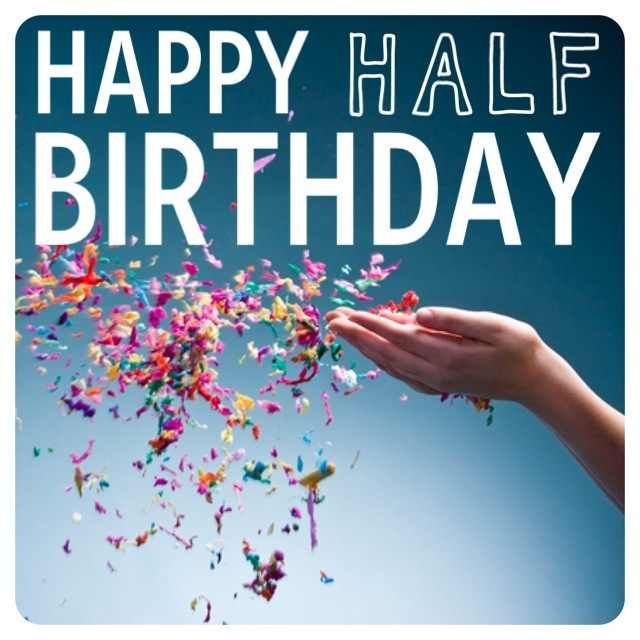 a happy half birthday card with confetti in the air and someone's hand reaching for it