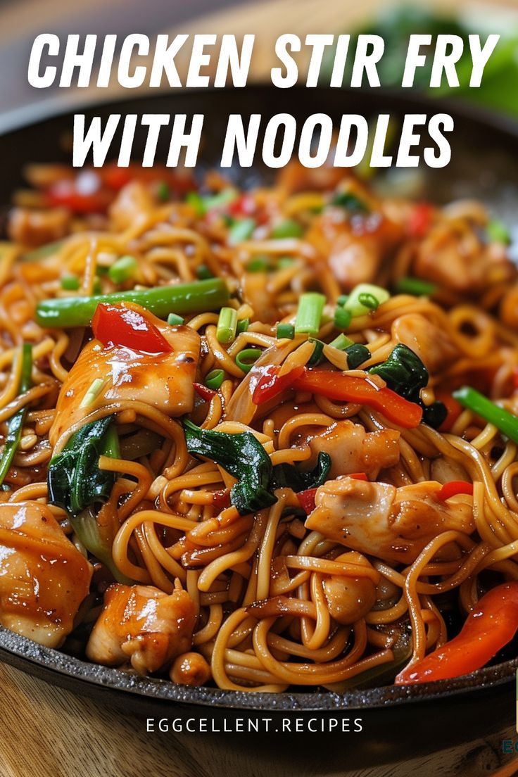 chicken stir fry with noodles in a skillet